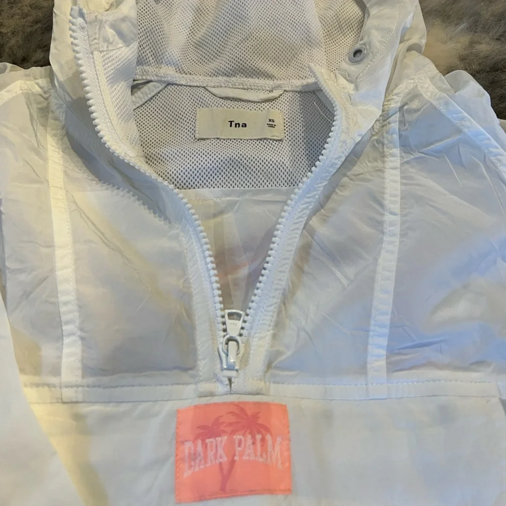 TNA Windbreaker Jacket – White
Excellent Condition - Picture 7 of 9